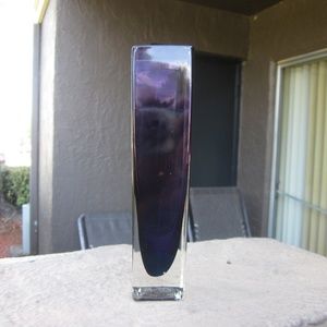 Small purple glass vase